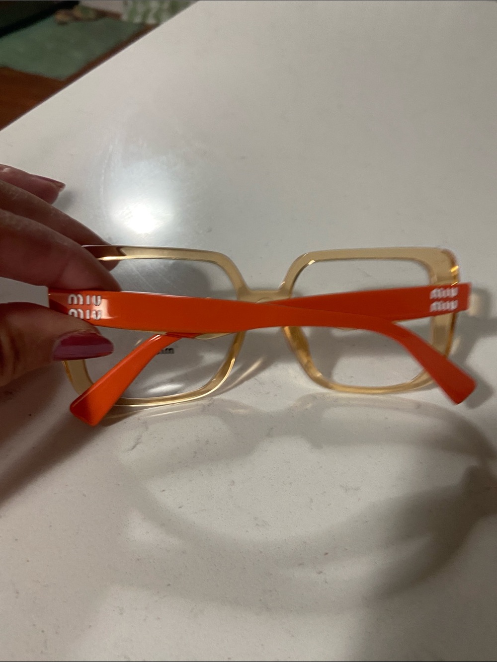 Miu Miu Women's Transparent Peach Square Glasses with orange Temples - Picture 5 of 5